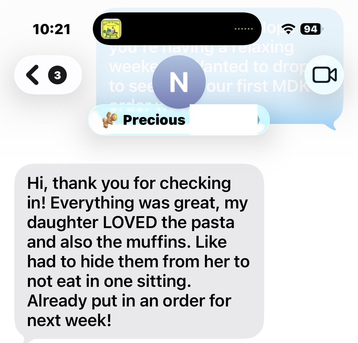 A screenshot of a mobile phone messaging app showing a conversation, with one message thanking for checking in, mentioning the daughter loved the pasta and muffins, and saying an order is placed for next week.