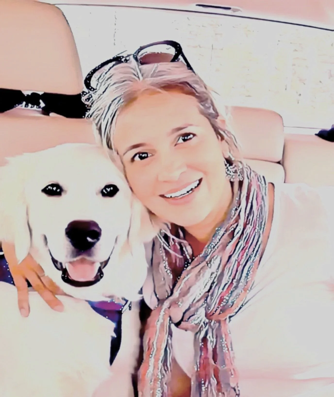 Our founder, Olga with her cream retriever dog, Kevin
