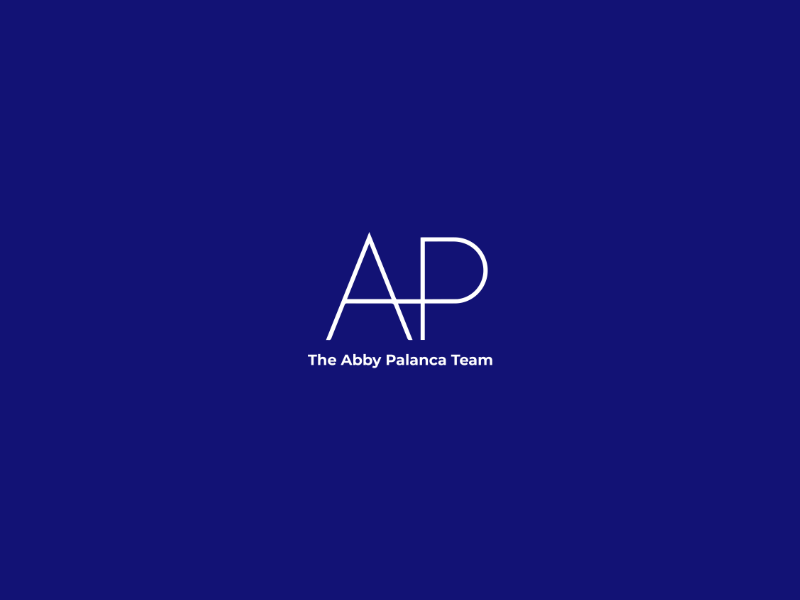 Blue background with white text displaying 'AP' and 'The Abby Palanca Team'.