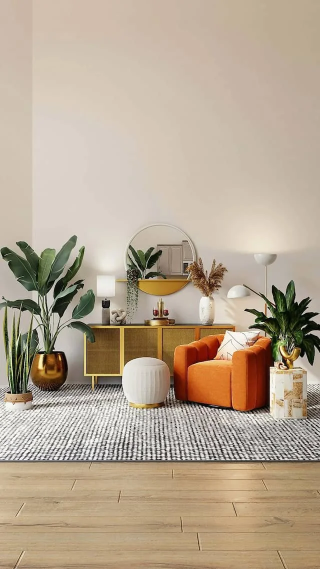 Living room corner with a mustard yellow sideboard, a round mirror, an orange armchair, and various potted plants on a black-and-white patterned rug with a wooden floor. A picture of a trauma therapists office