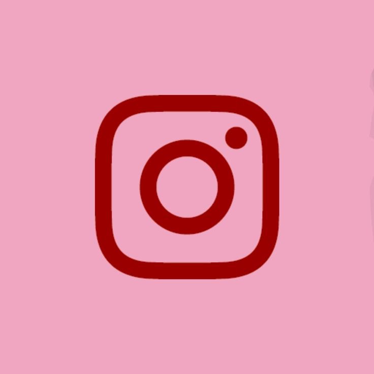 Instagram logo in red on a pink background.