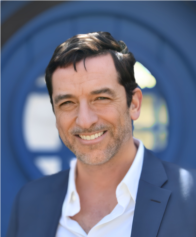 Bio Pic Blue Suit Retouched .png