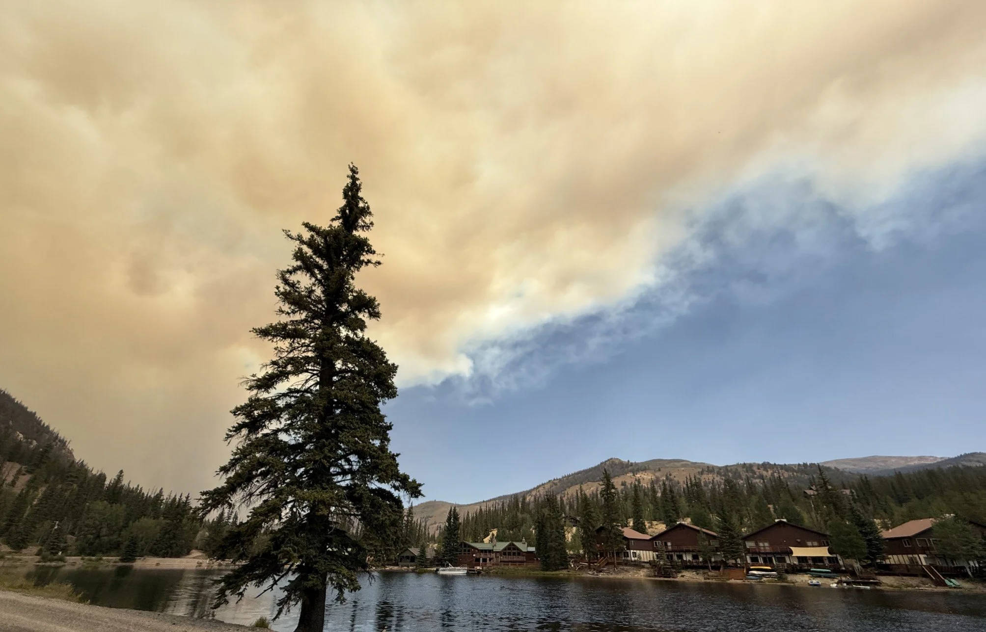 Still getting closer... notice the contrast of wildfire smoke and the clean, mountain air, that we breath. 