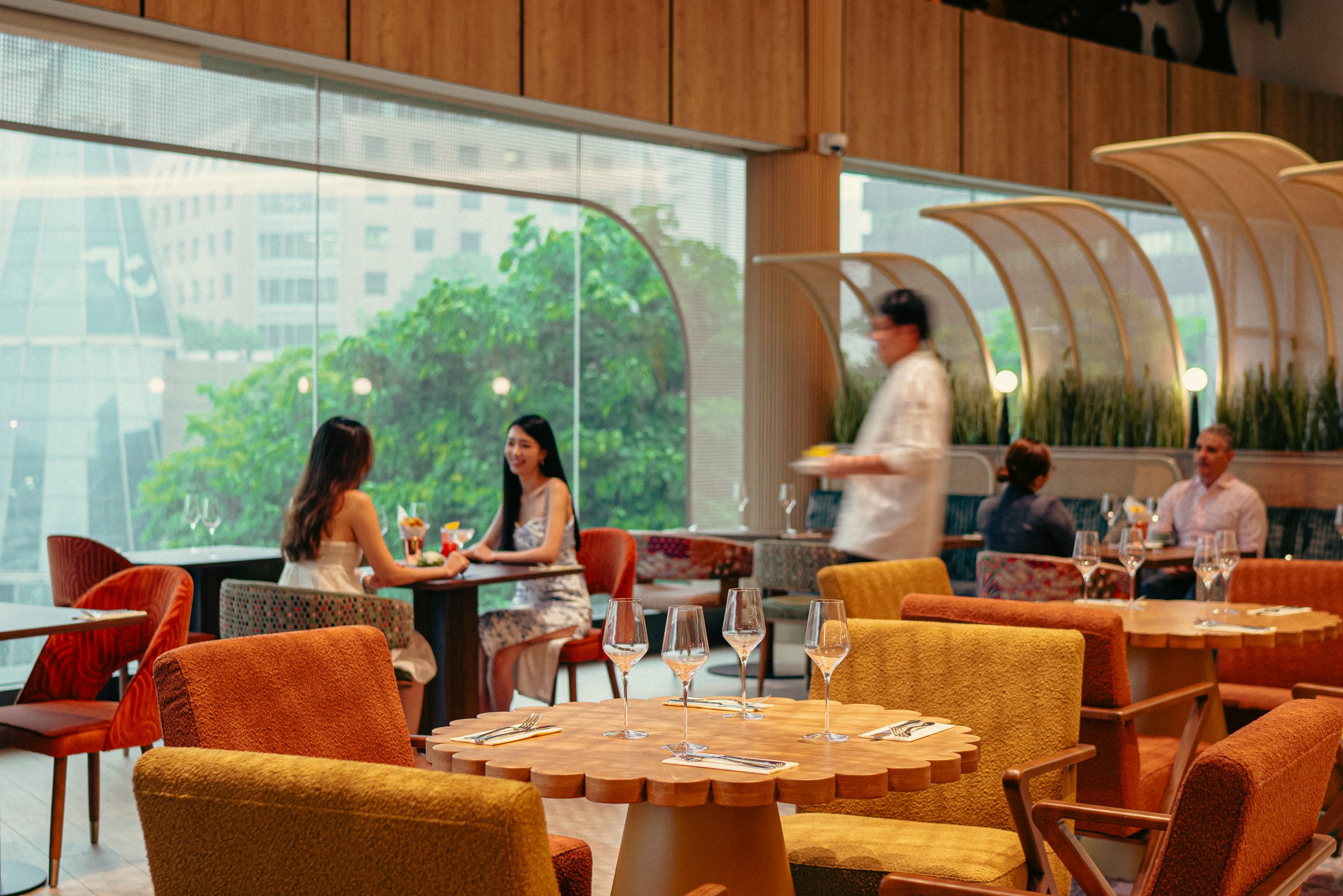 A beautiful table setting with a view - a look inside Centro Restaurant on Orchard Road in Singapore. Find us on Level 5 at Shaw Lido, Shaw Theatres.