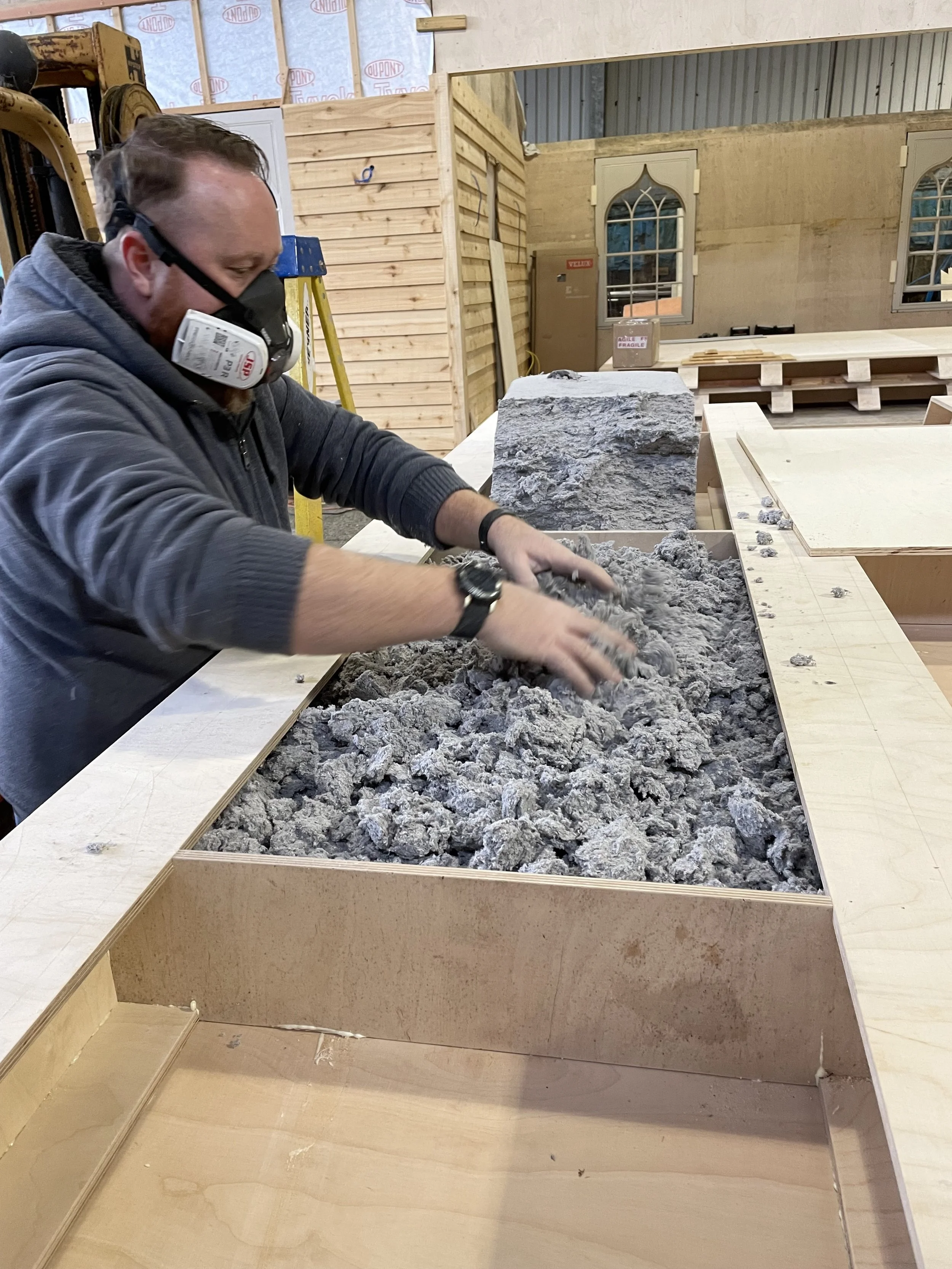 Upcycled newspaper insulation.jpeg