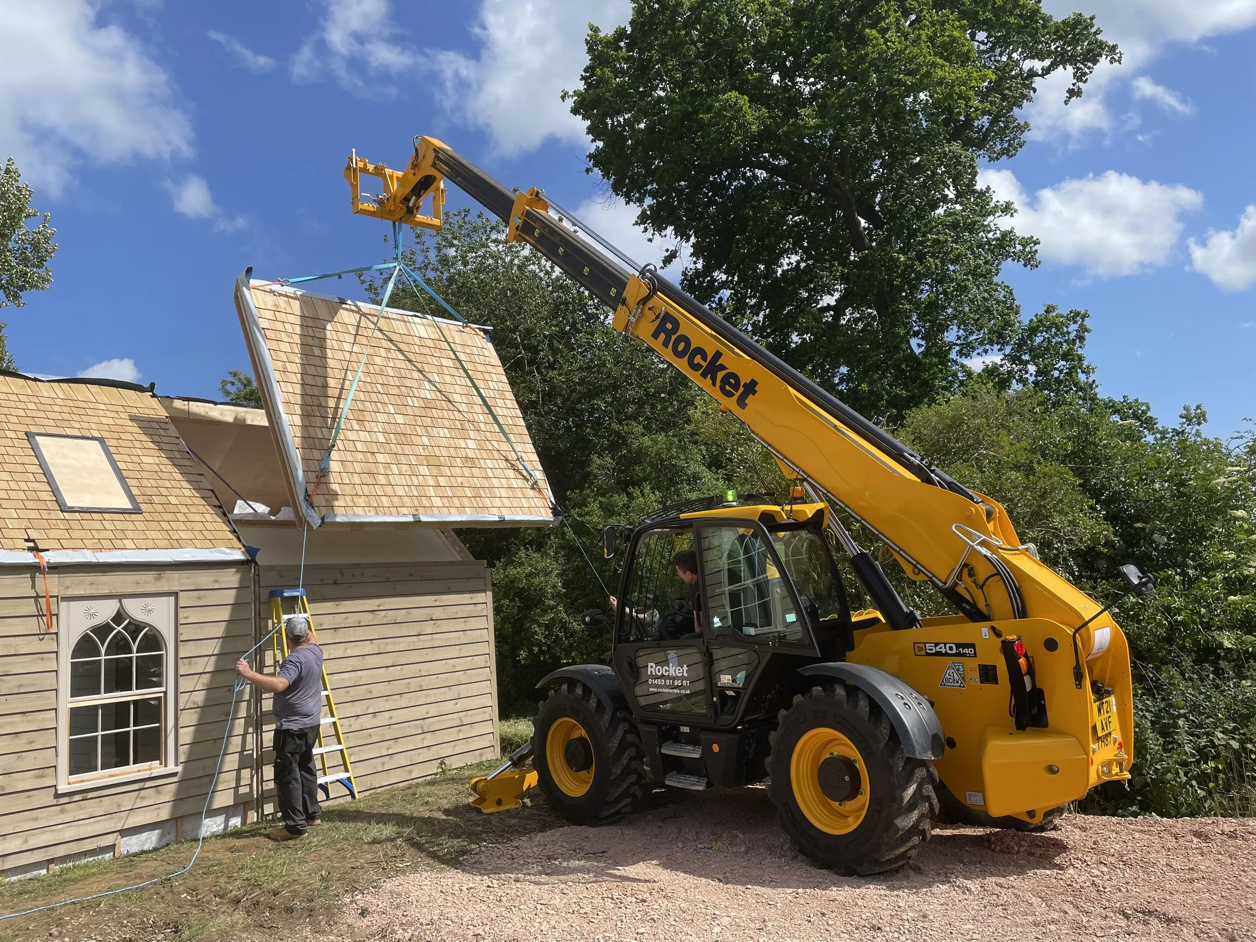Larch Shingle Roof Panel Installation.jpeg