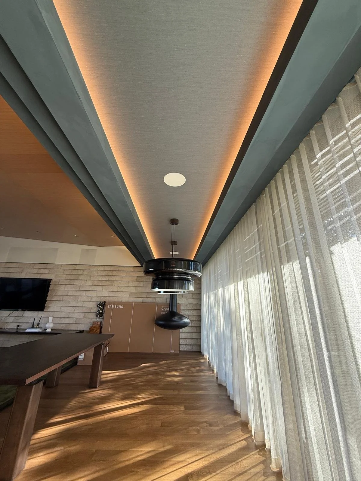 Modern interior area with plastered ceiling