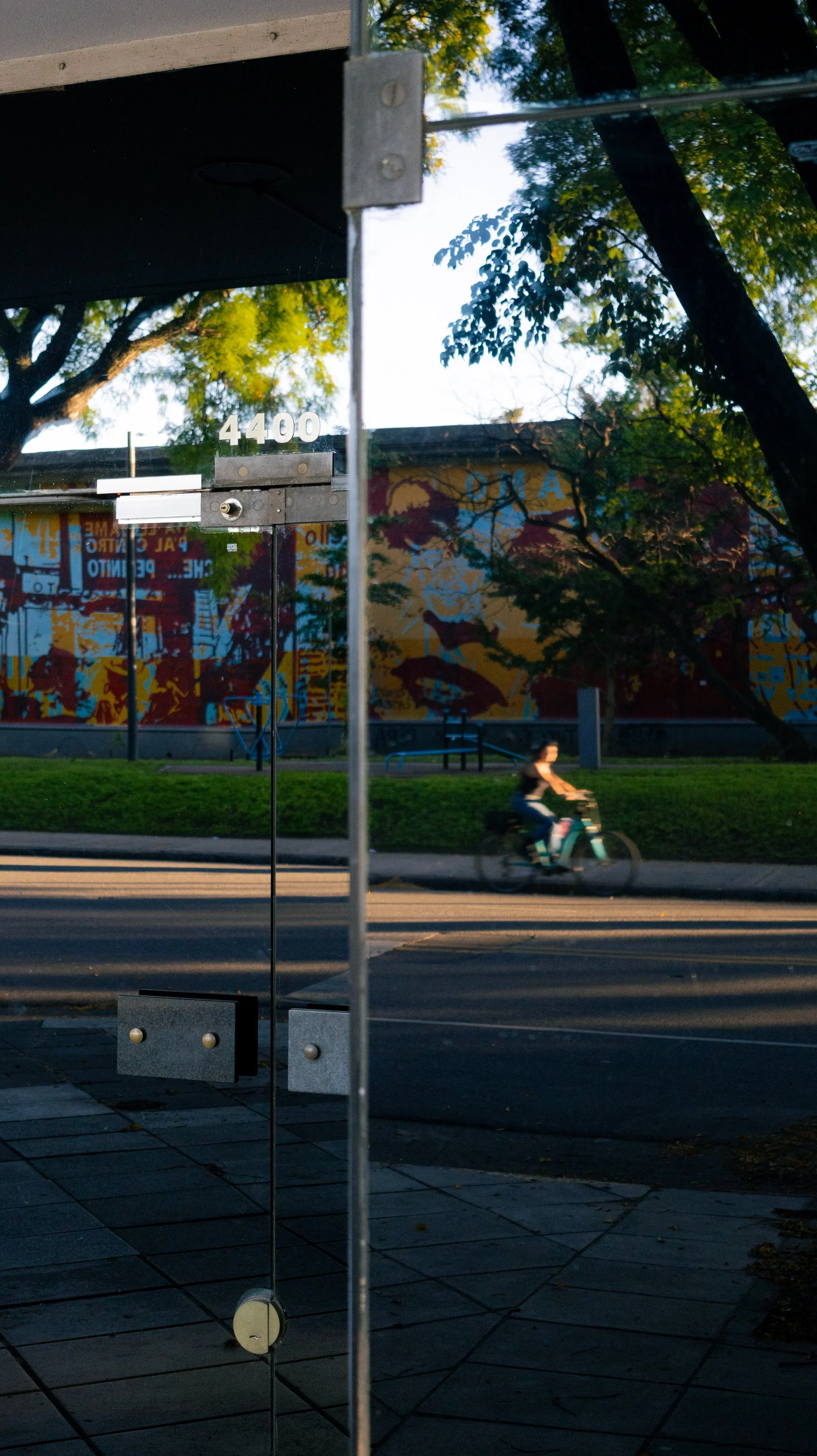 Reflections of graffitis and a bicycle in Chacarita