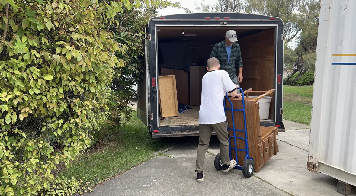 trailer and movers moving furniture