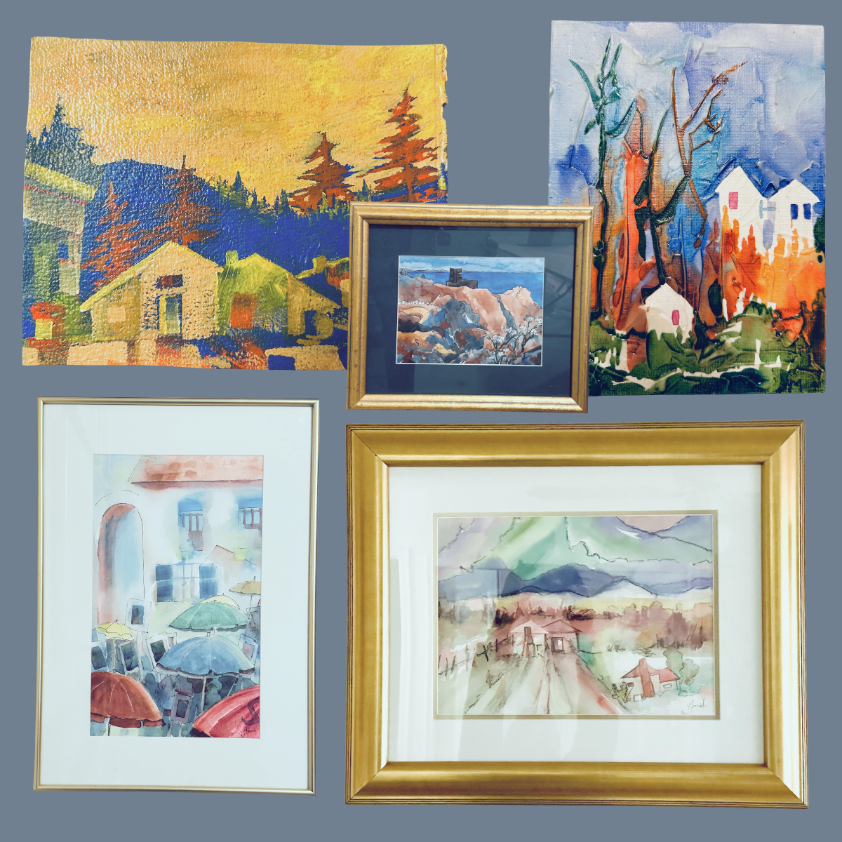 A collection of five framed watercolor paintings depicting various landscapes and scenes, including houses, trees, mountains, and umbrellas, arranged on a gray background.