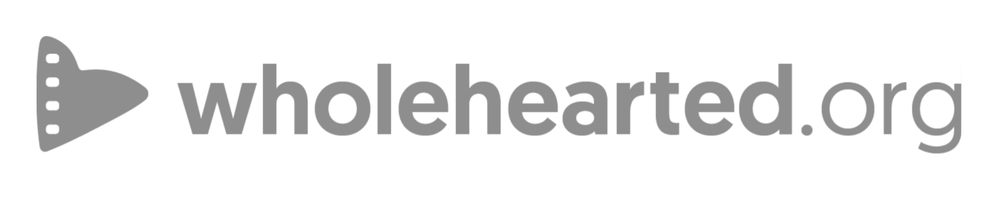 Logo of wholehearted.org with a heart icon in gray