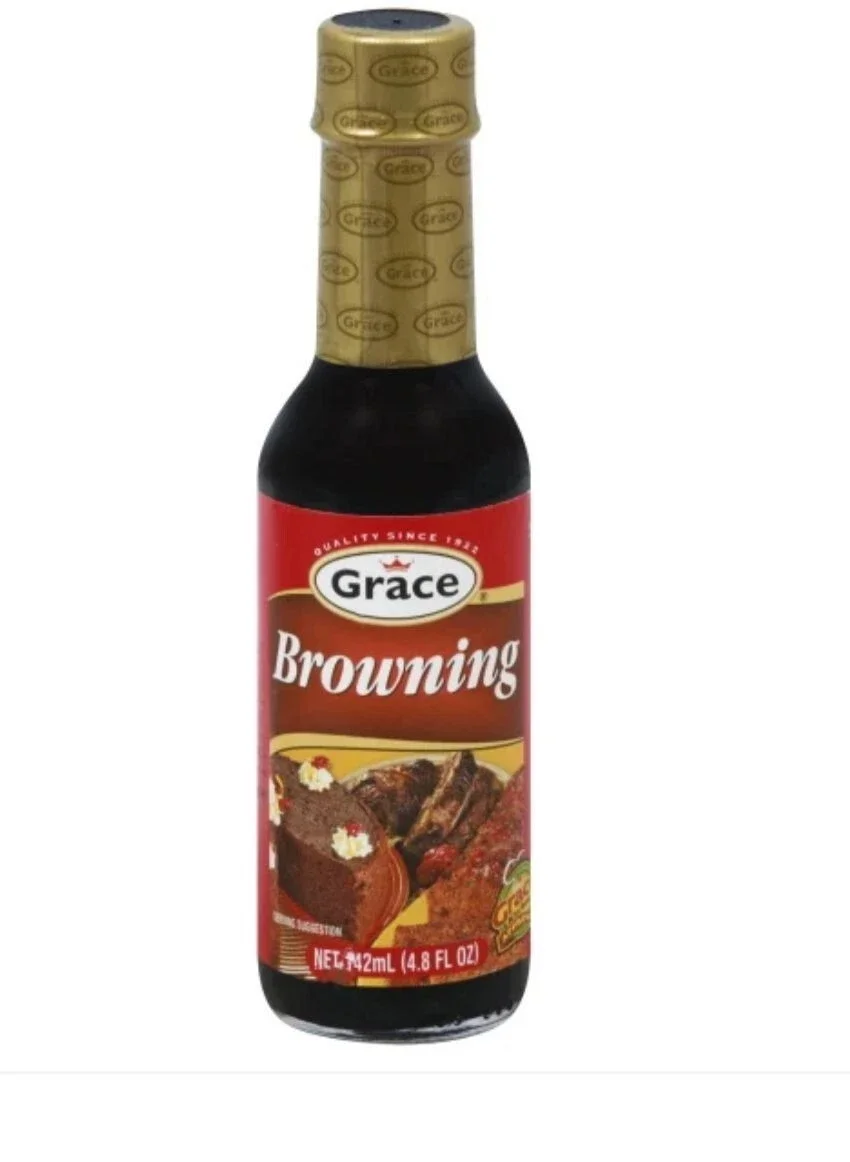Bottle of Grace Browning sauce with a red label and gold cap, showing images of chocolate cake and beef roast.