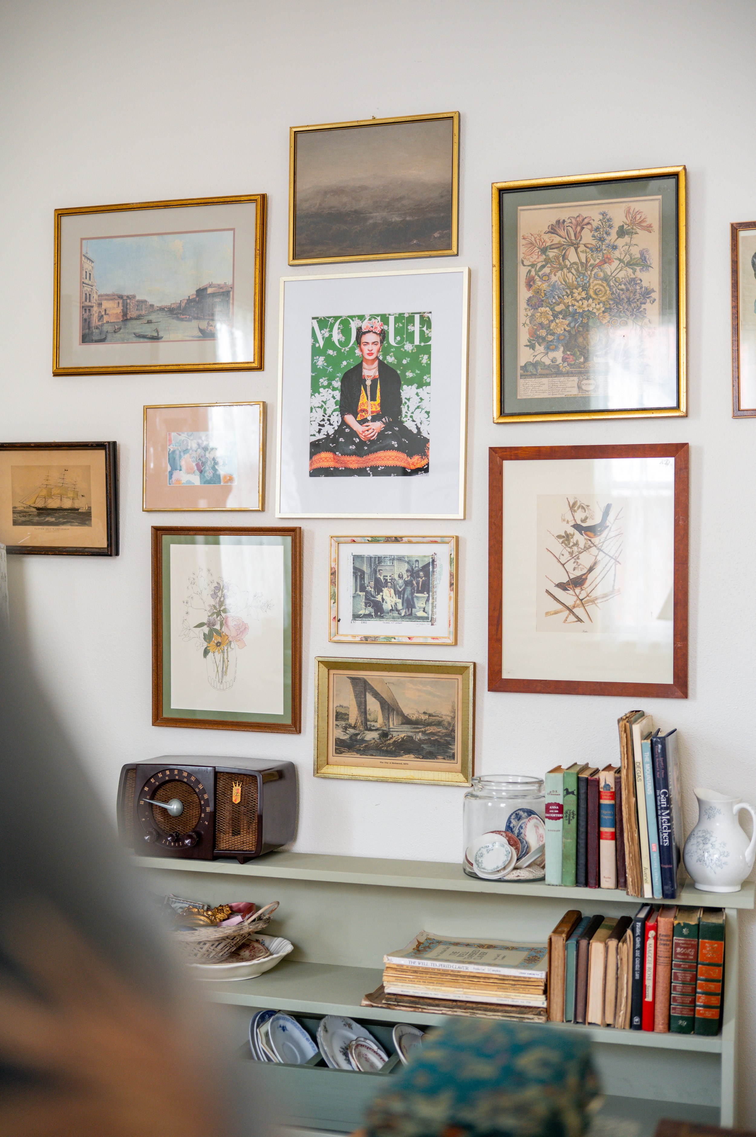 The office happens to be where most of the portraits settled, including Frida Kahlo and the band Squirrel Nut Zippers. From this view, you can just make out the collection of pretty plates on the bottom shelf.