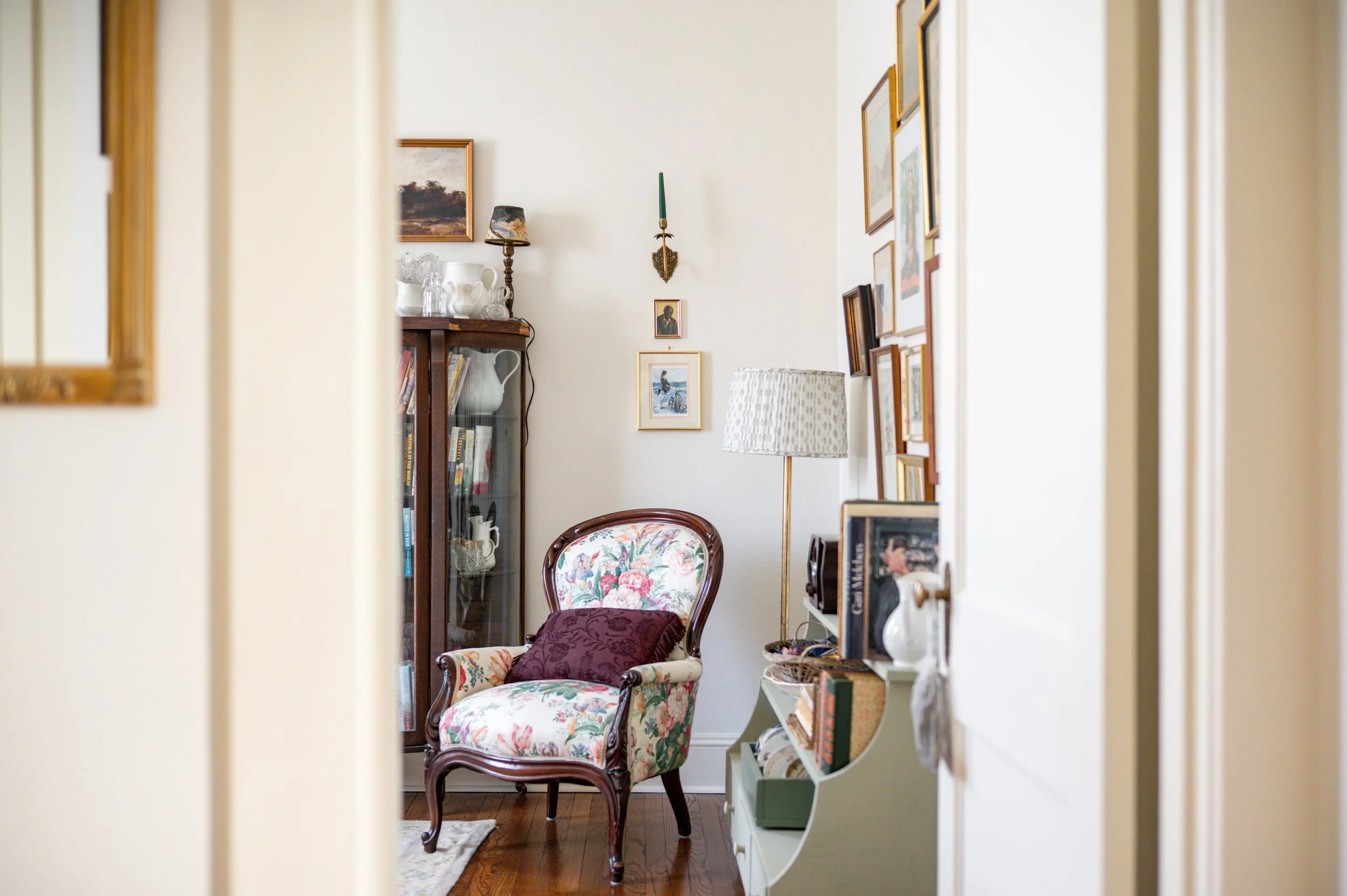 I was determined to place the china cabinet where I could see it every day from the hallway, and I filled it with books after seeing Cristy do it with hers. I painted the little shelves and drawers unit a sage green after being offered it for free ou