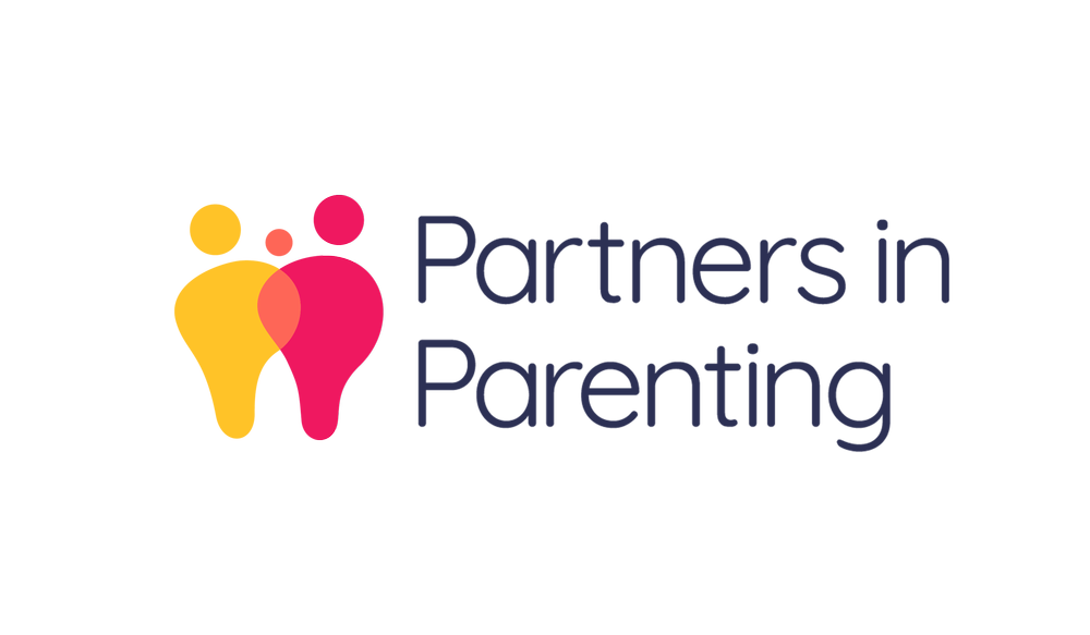 Logo of Partners in Parenting featuring stylized illustrations of two adult figures in yellow and pink, and two smaller circles representing children, with the text 'Partners in Parenting' next to the figures.