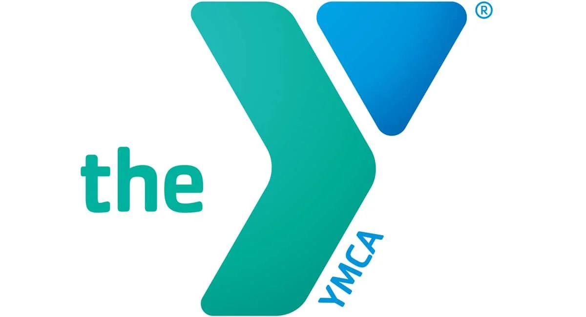 The YMCA logo featuring a stylized teal and blue 'Y' with the words 'the' on the left and 'YMCA' on the bottom right.