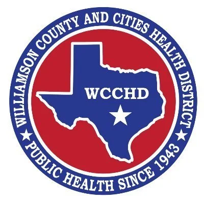 Seal for Williamson County and Cities Health District with a blue outline of Texas, a white star, and text indicating public health since 1943.