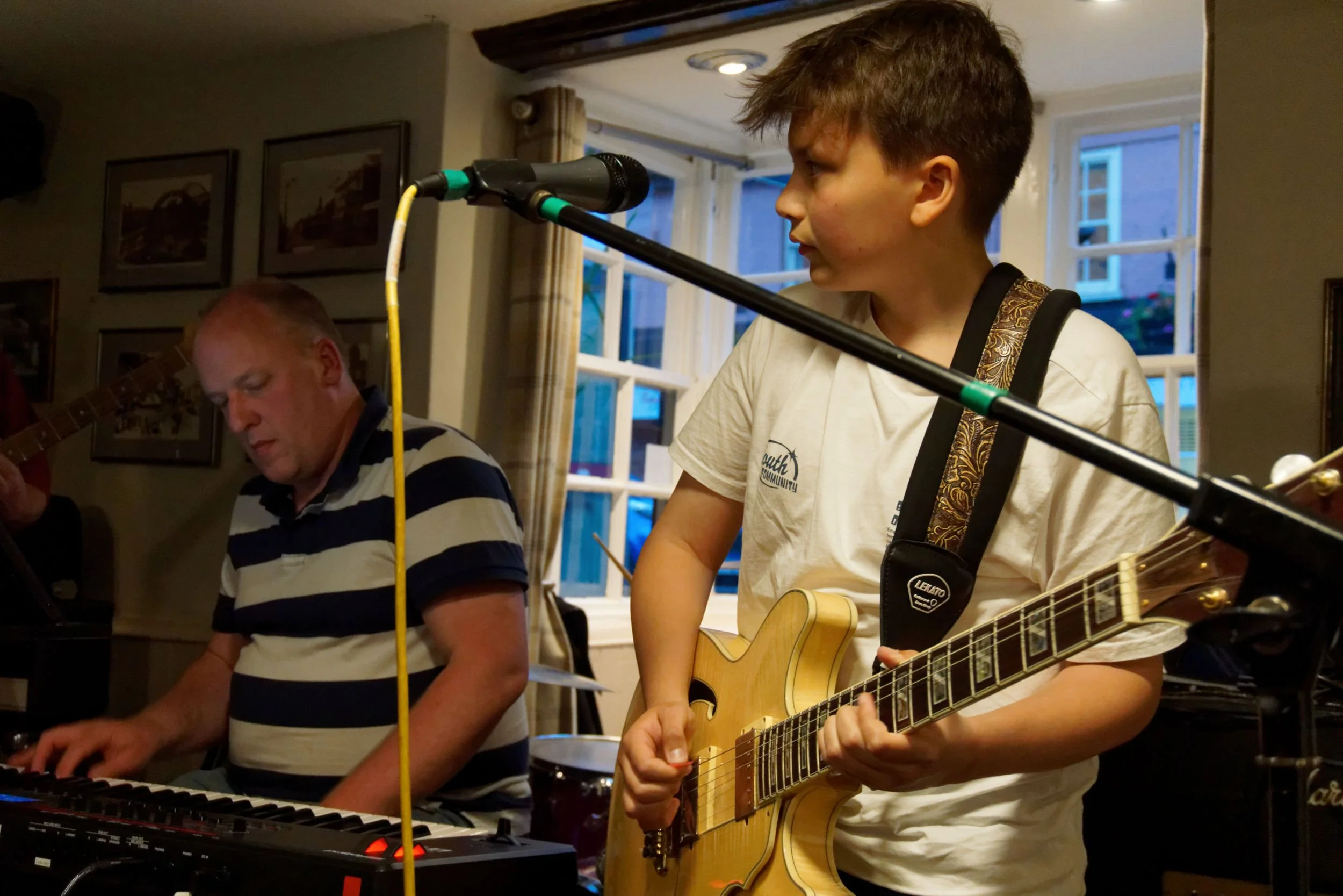 Young musician at the open mic night, the Old George, Stony Stratford.