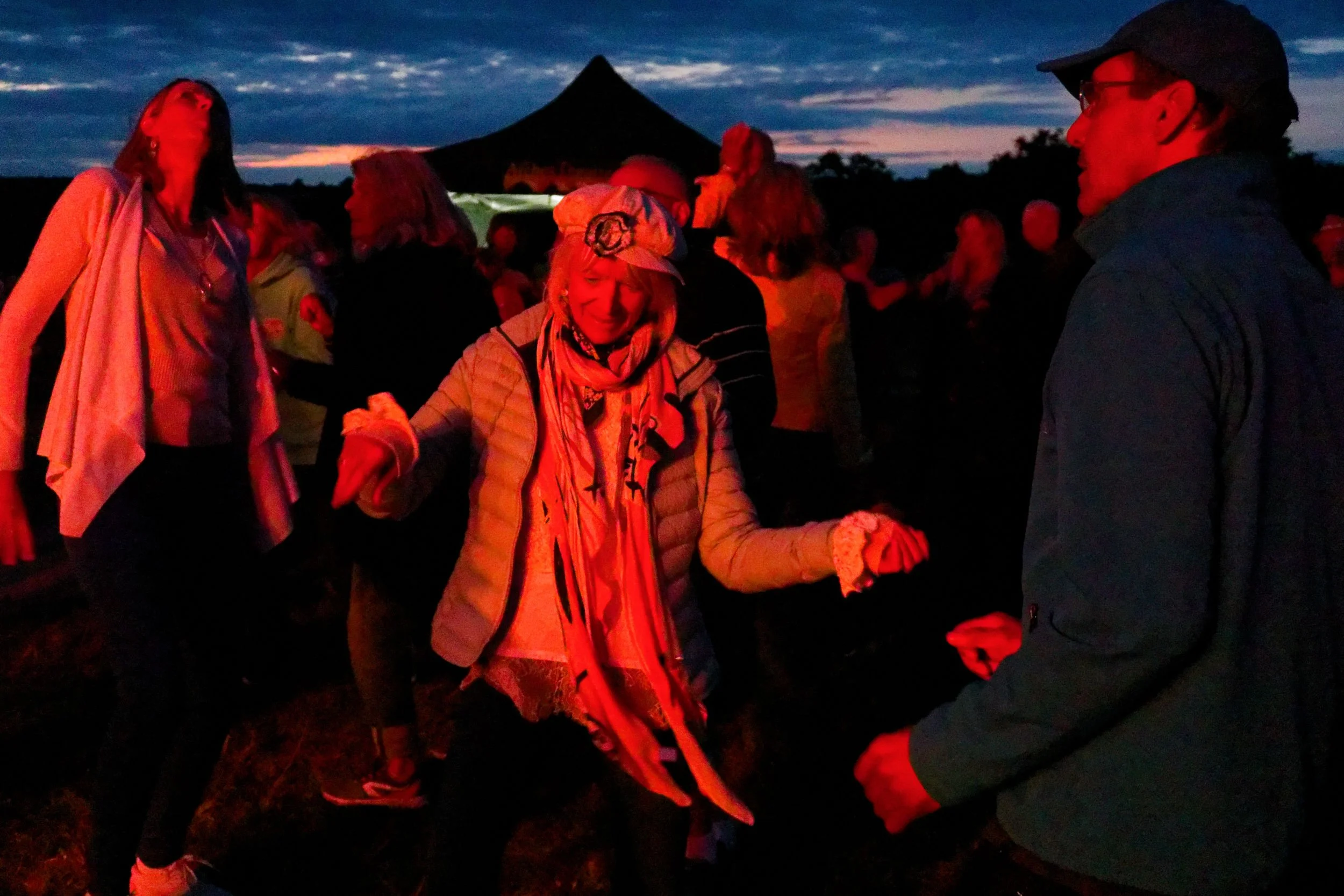 The dancing audience of a Queen Tribute band, at Clifton Reynes, Bucks.