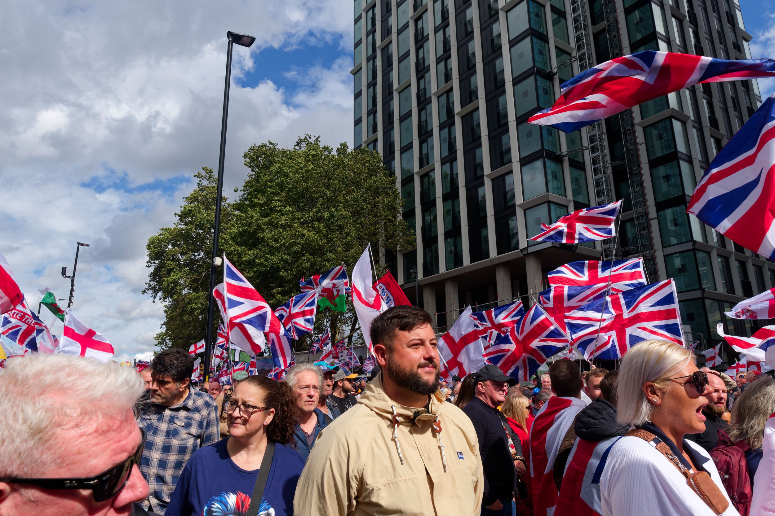 Union Jack and St George's Cross flags at Unite the Kingdom march.