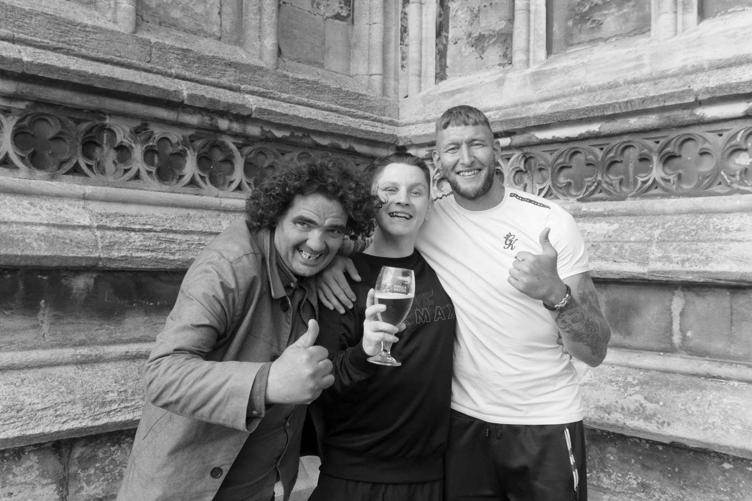 Three locals at the base of the Stump in Boston, Lincolnshire.