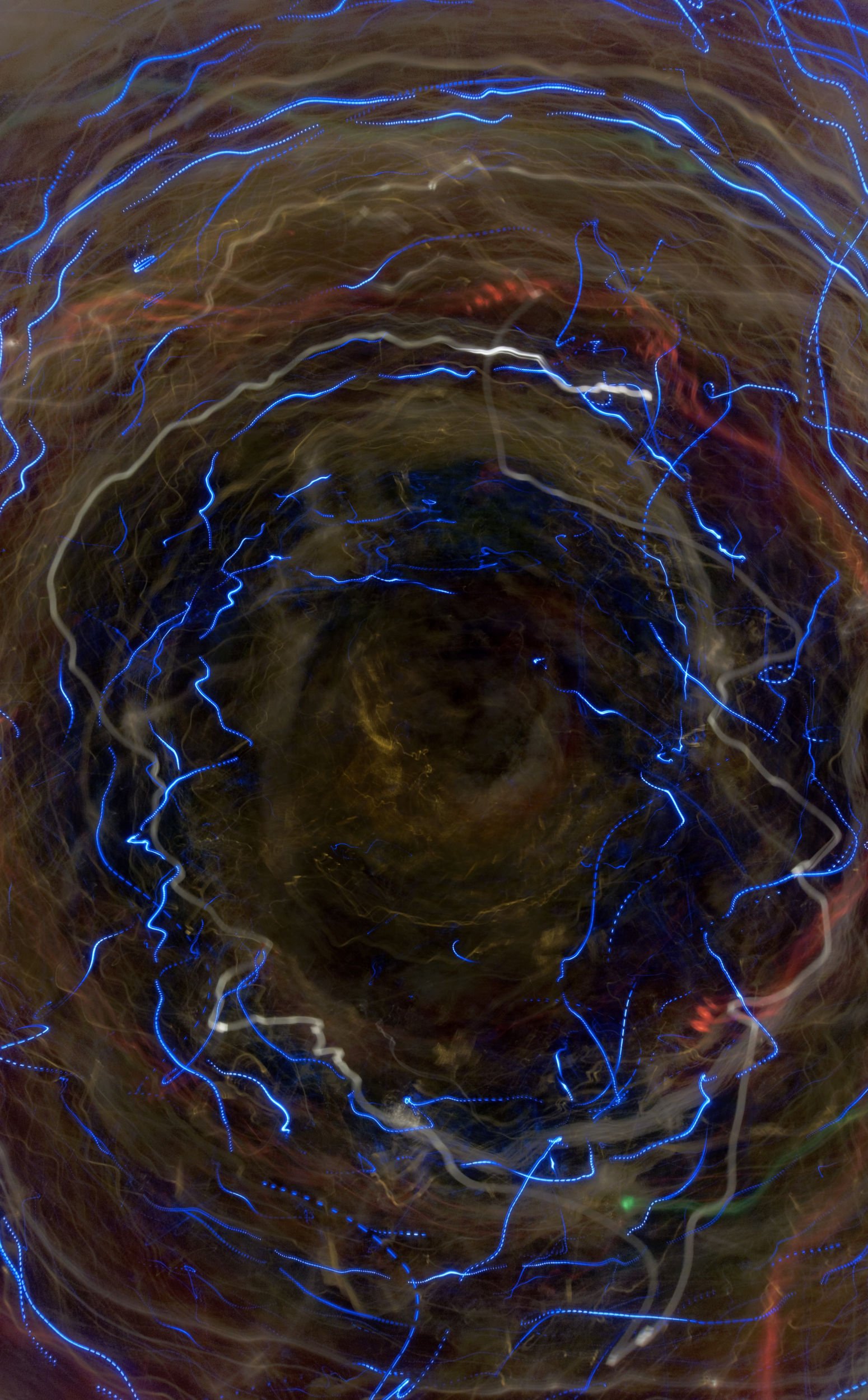 An enormous void with blue lightning discharging around it.
