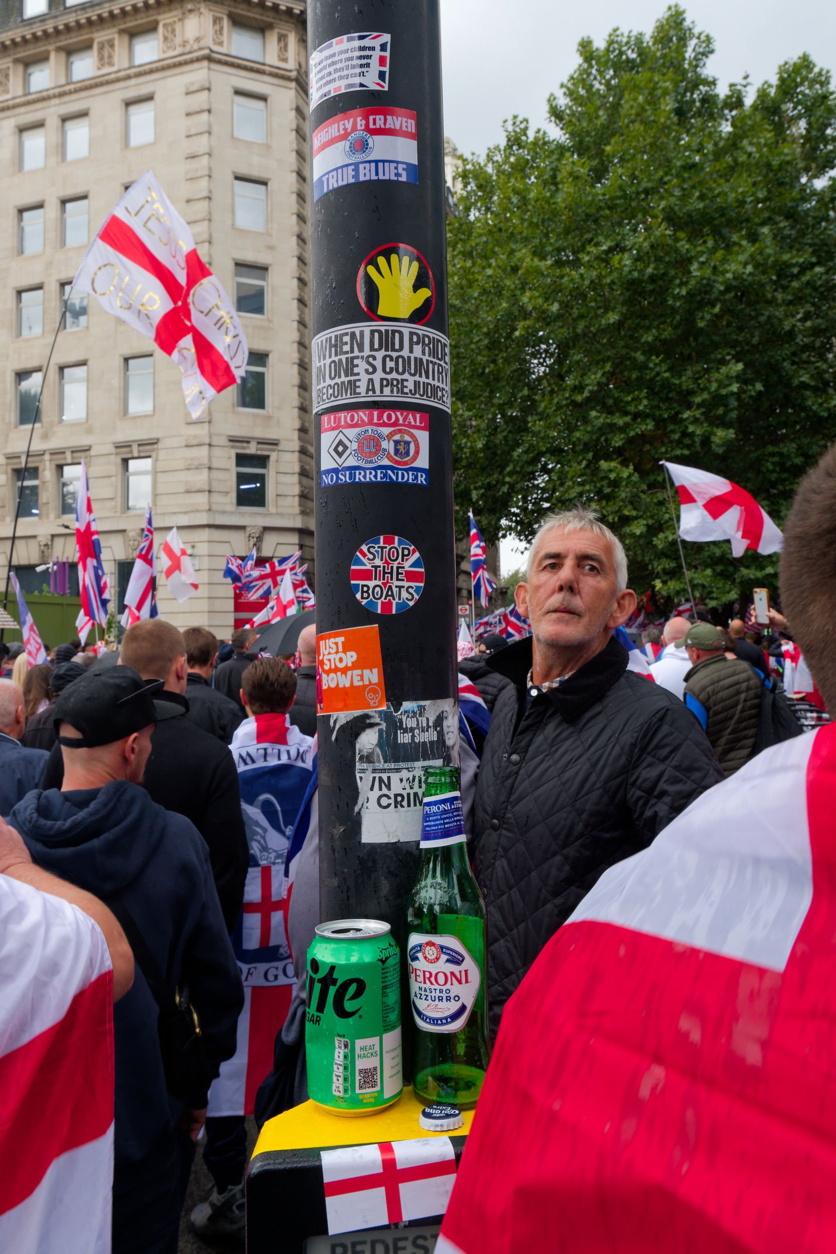 Protest stickers on a pelican crossing, at the Unite the Kingdom march.