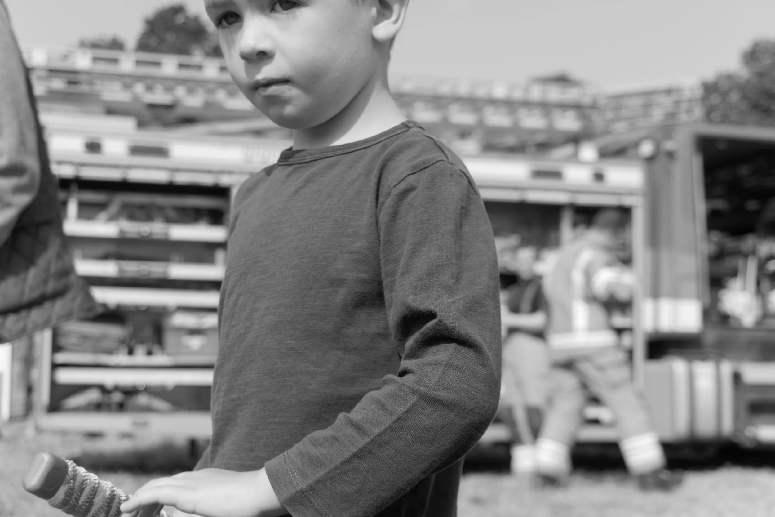 Young boy with toy sword at a country show in Winslow, Bucks.