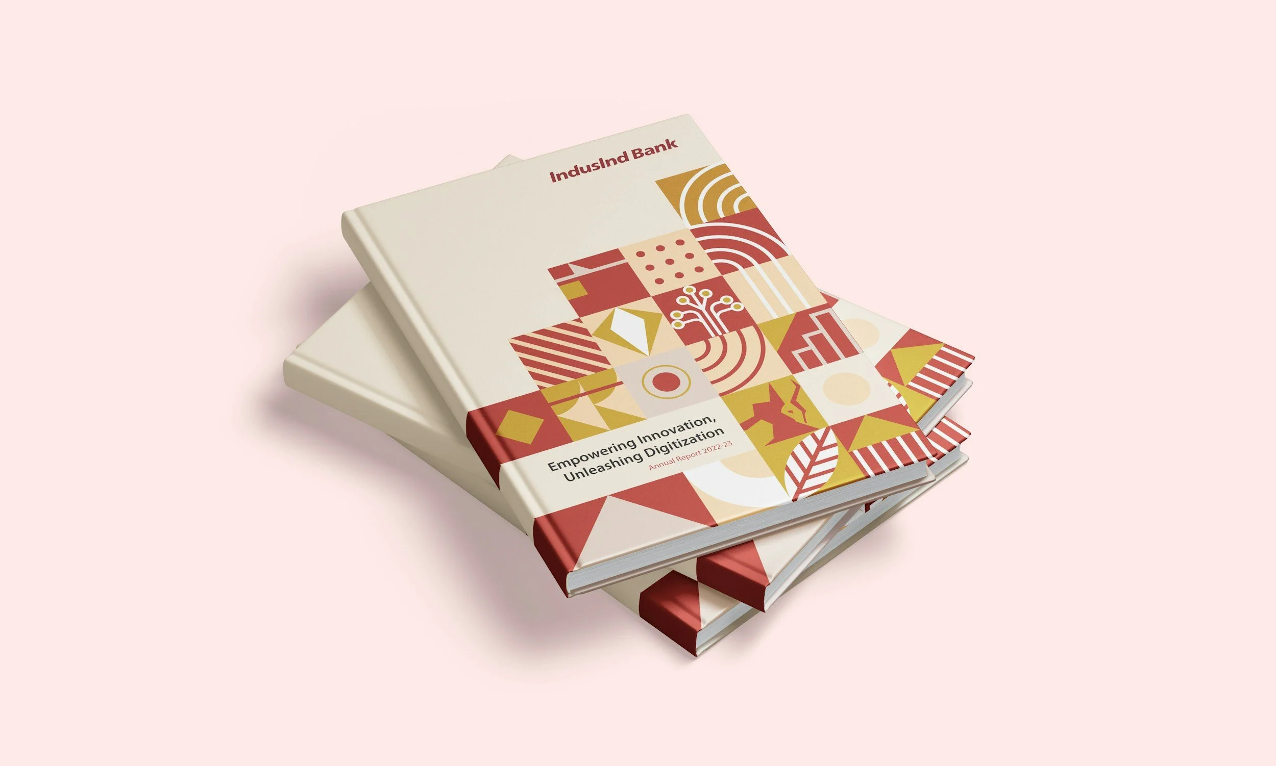 Two stacked books titled "Empowering Innovation, Unleashing Digitization" with abstract geometric cover designs, placed on a pink background.