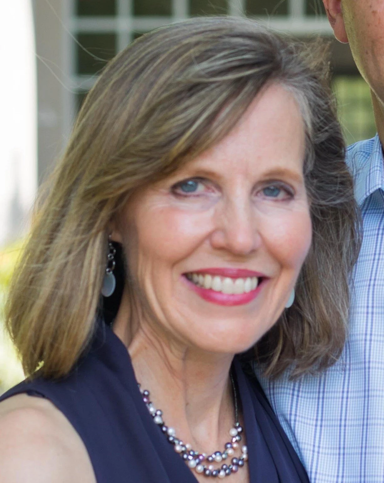 Jane Labban wearing blue blouse