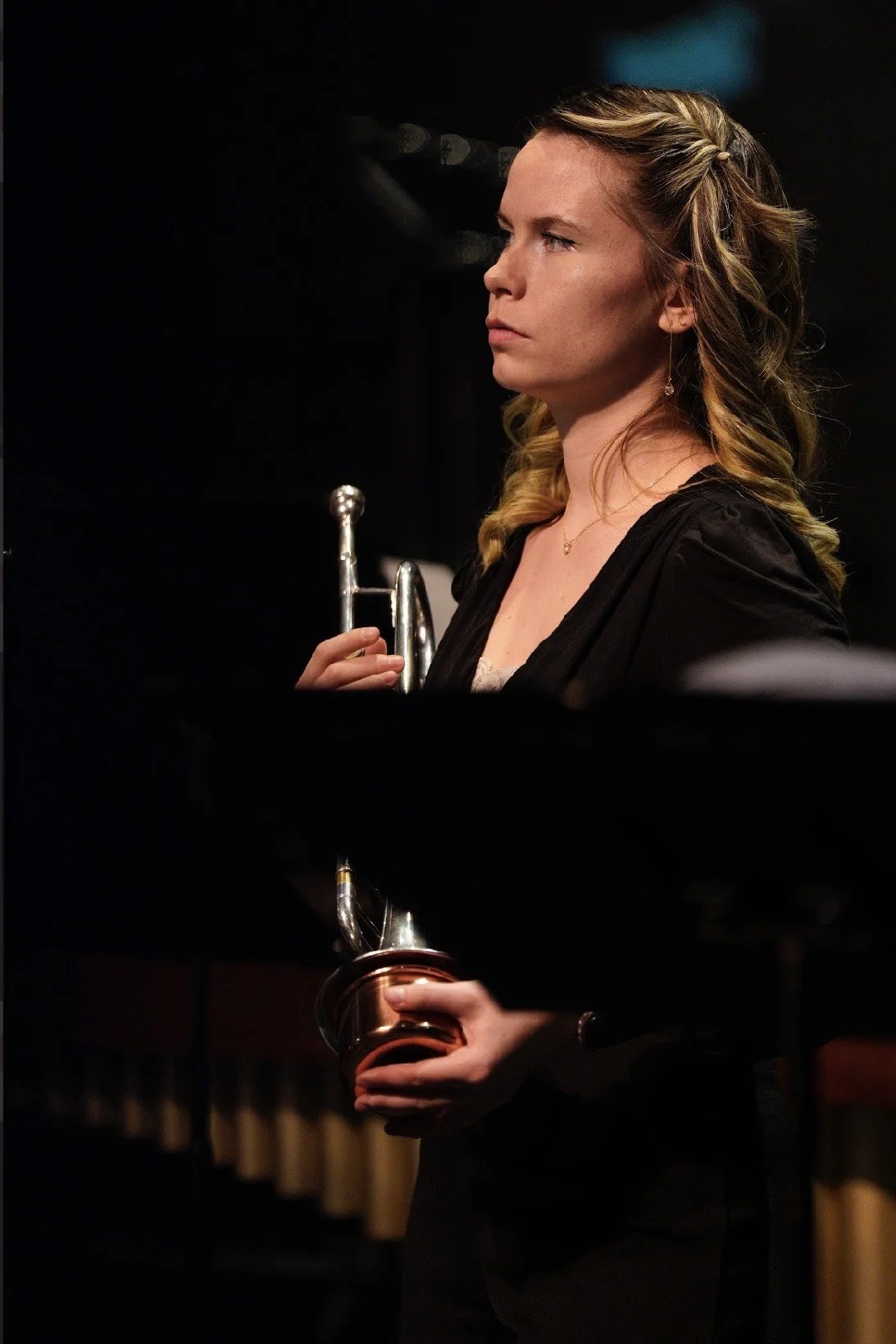 Jillian scott holding a trumpet