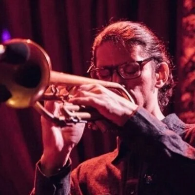 man playing a trumpet