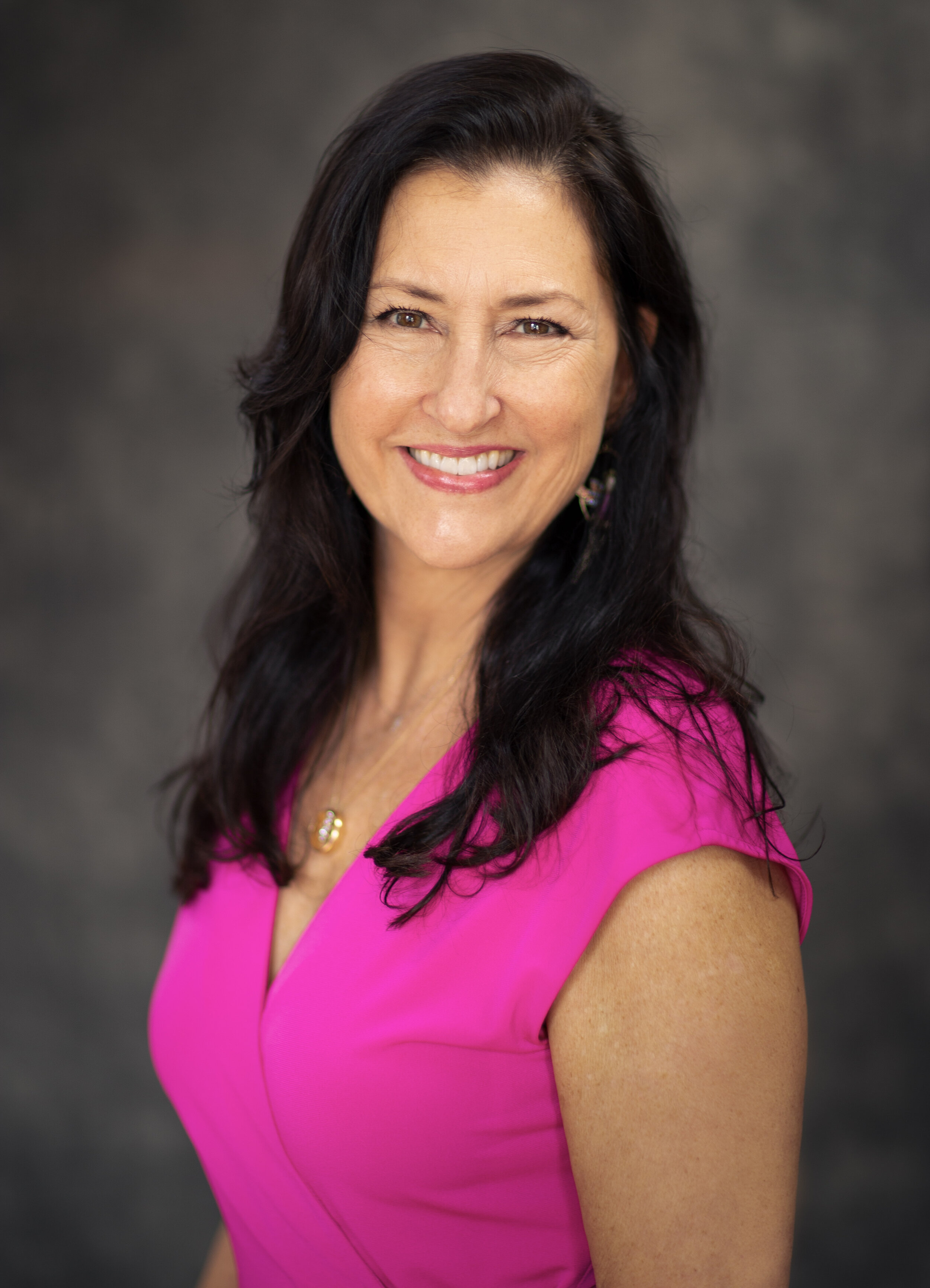 Laura Hines Wittman wearing a pink dress