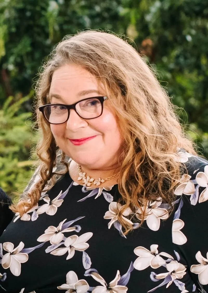 Portrait of a woman who provides legal services for mental health providers.