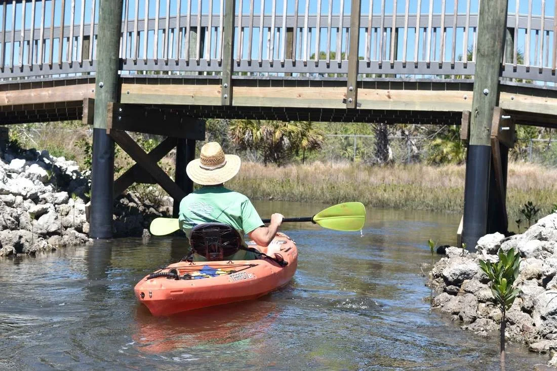 Kayaking Underneath Footbridge