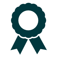 A teal-colored ribbon award or medal with a circular center and two hanging ribbons.