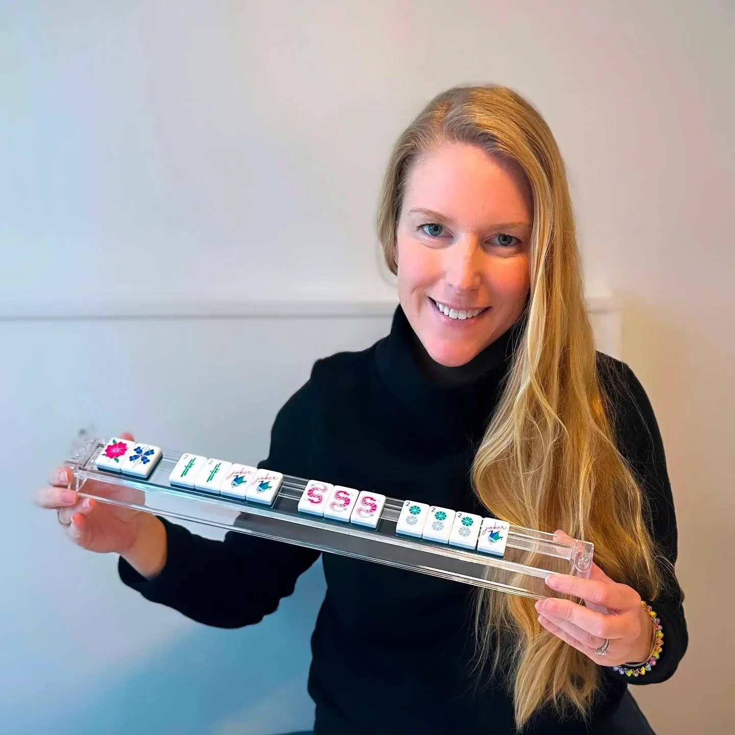 Meet Elizabeth! 👋 A California native who called SF, Copenhagen, and Denver home before settling in Atlanta. Elizabeth loves nothing more than putting her kids to bed, pouring a glass of wine, and meeting up with her girlfriends for a game (or three