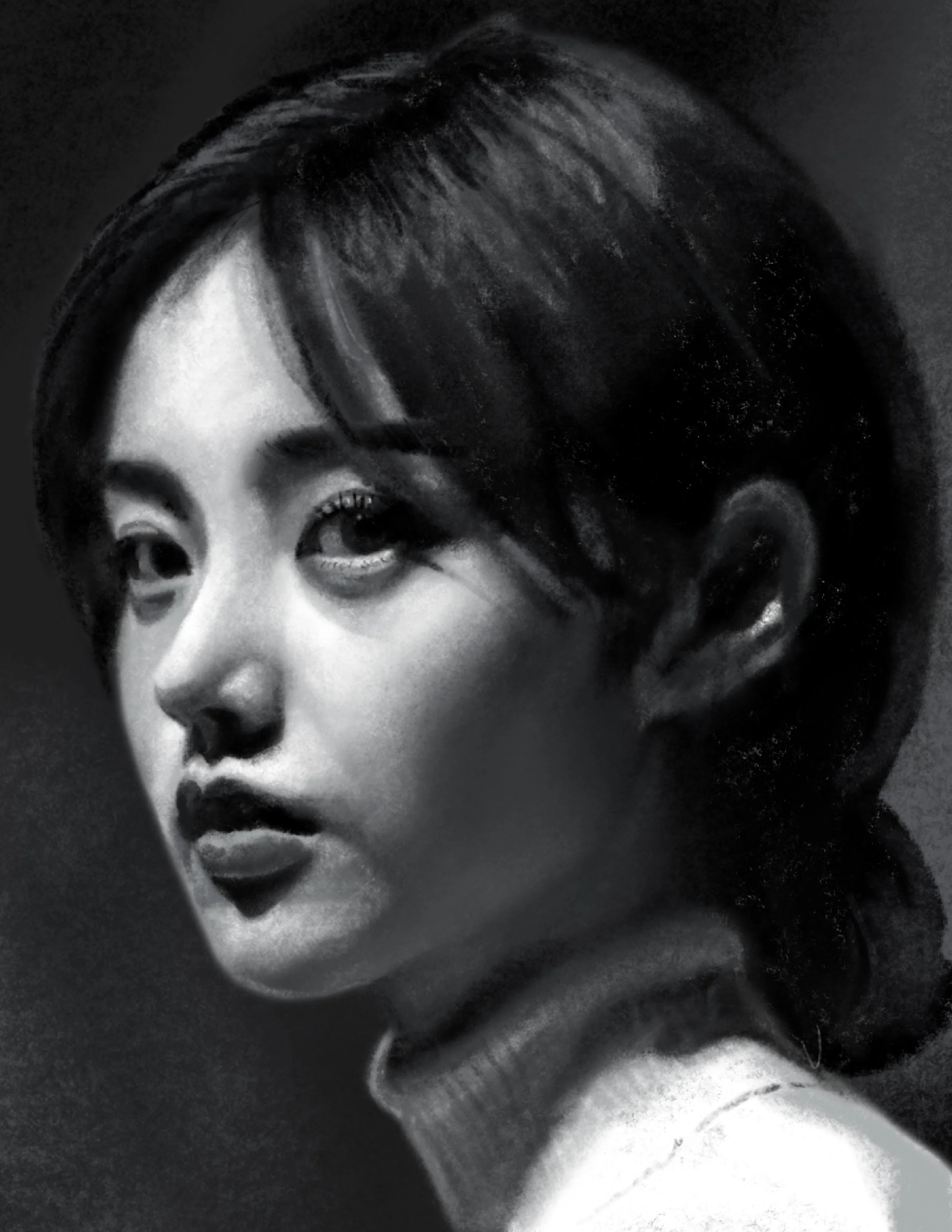 Close-up of a woman's face in black and white, showing her eye, nose, and lips with short hair, against a dark background.