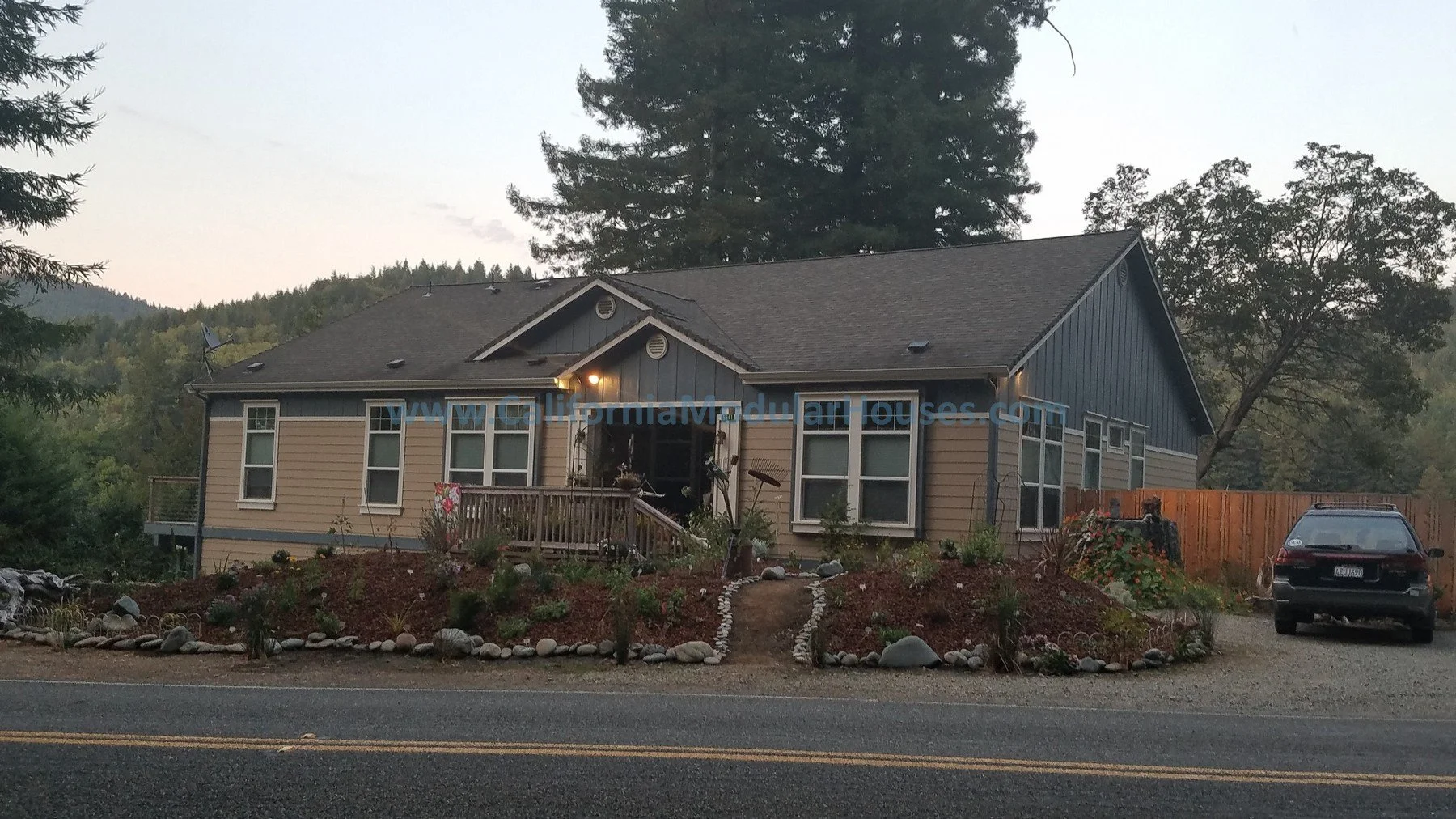 Modular Home CA, Prefab Modular California, California Modular Home, A new single family residence with a gable roof, painted in beige and blue.