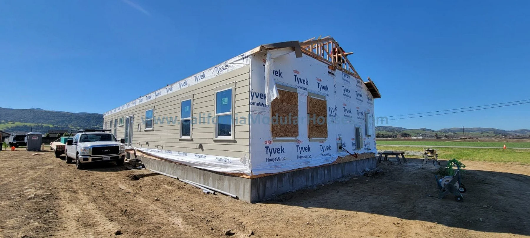 Modules for this factory built home delivered to the job-site in San Juan Bautista.  Custom design.  Prefab modular.  Modular home for California.  