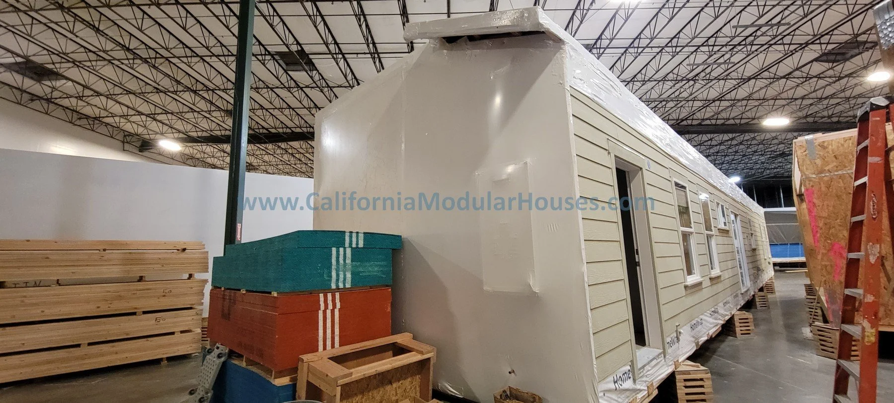 Modular home getting ready for delivery to the job-site in San Juan Bautista, CA.  Prefab modular.  California.  3 bedrooms, 2 bathrooms. 