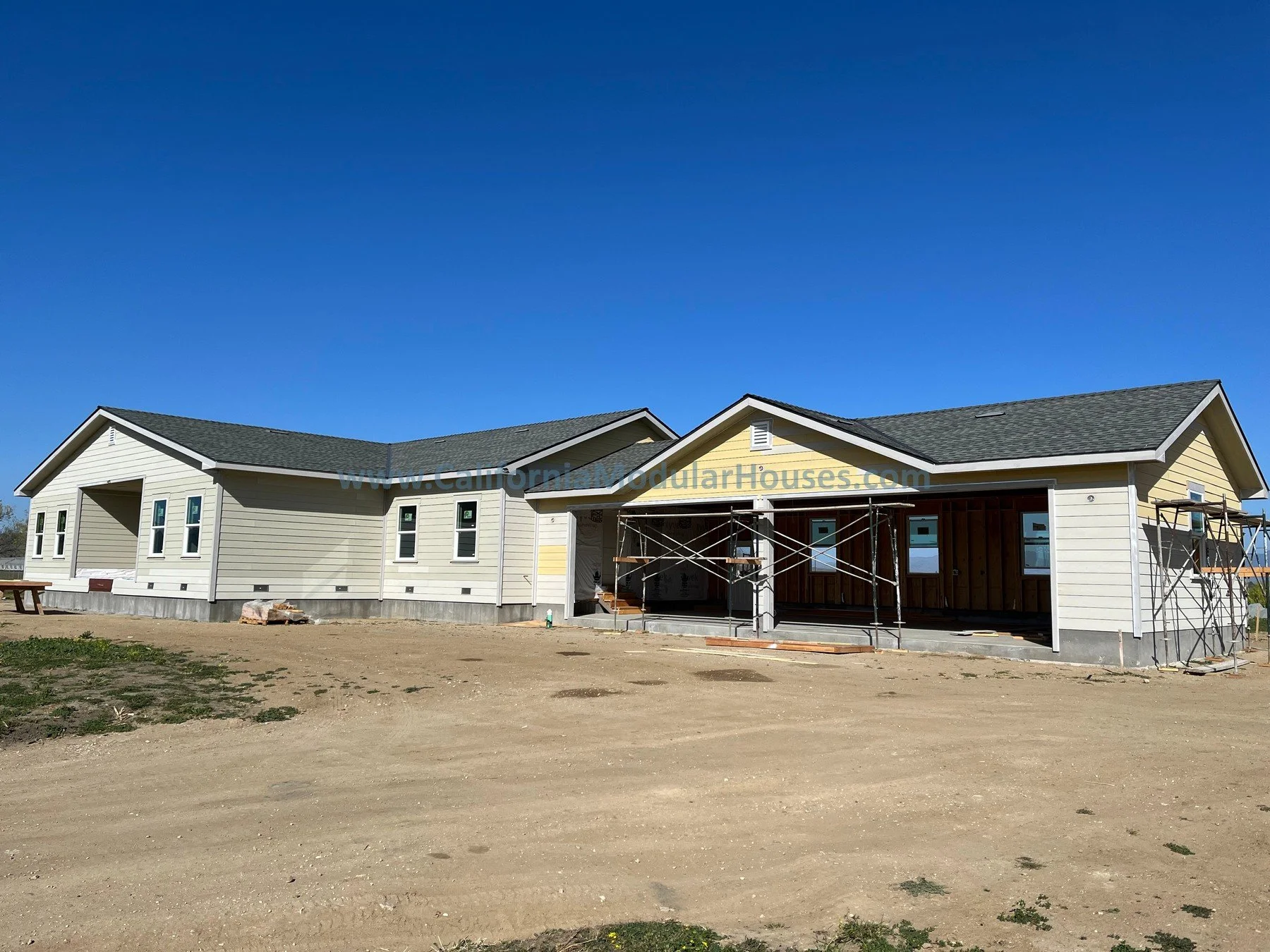 Progress image of a Modular house being completed on-site by the General Contractor  Caliornia  Prefab modular Pre-fab Modulars CA.  