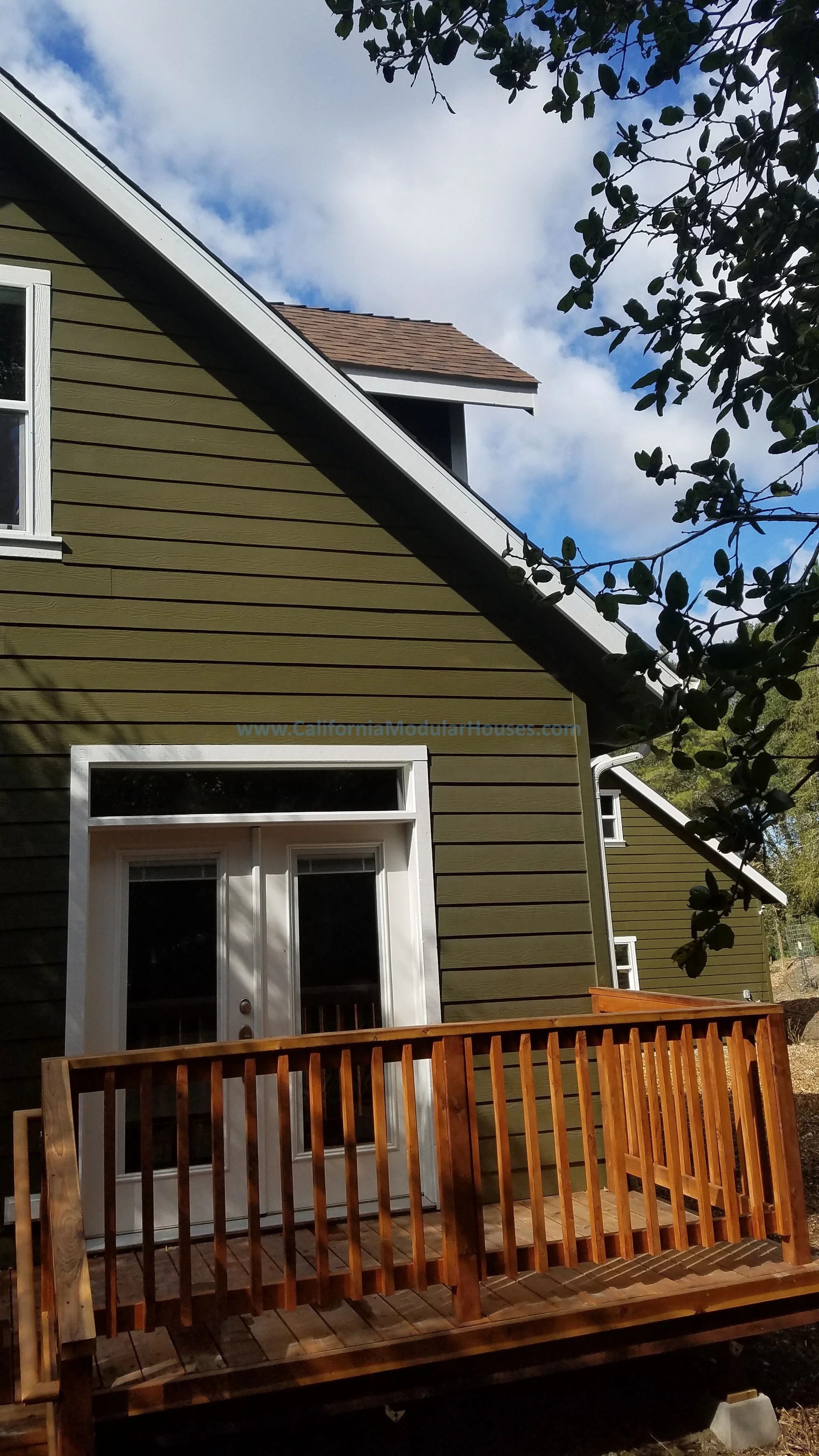 It's a beautiful day in Orinda California, Contra Costa County.  The transom window over the French Doors allows for additional lighting and also makes the home that much more beautiful.   Pre-Fab.  