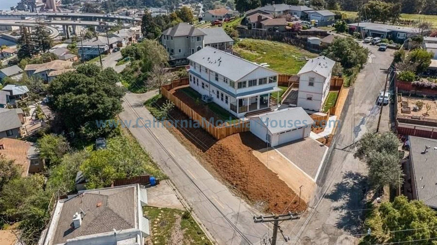 Aerial view of a 2 story modular home with an Accessory Dwelling Unit.  Contra Costa County, CA.  Prefab.   Image 6