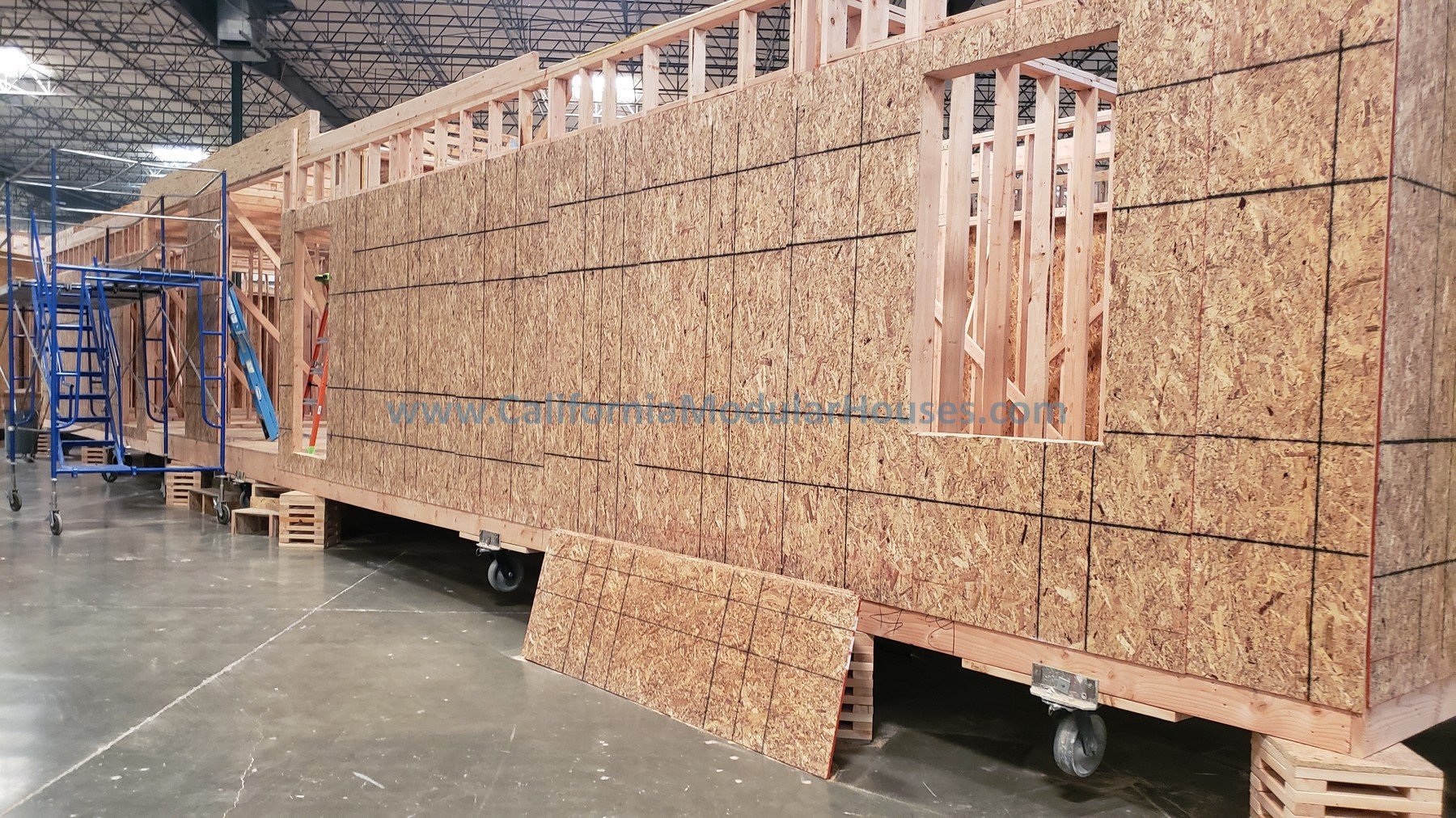 The inner factory workings for a Factory Built Home.  Factory Built Housing.  Framing.  California Modular.  Prefab Modular.  Going to San Juan Bautista.