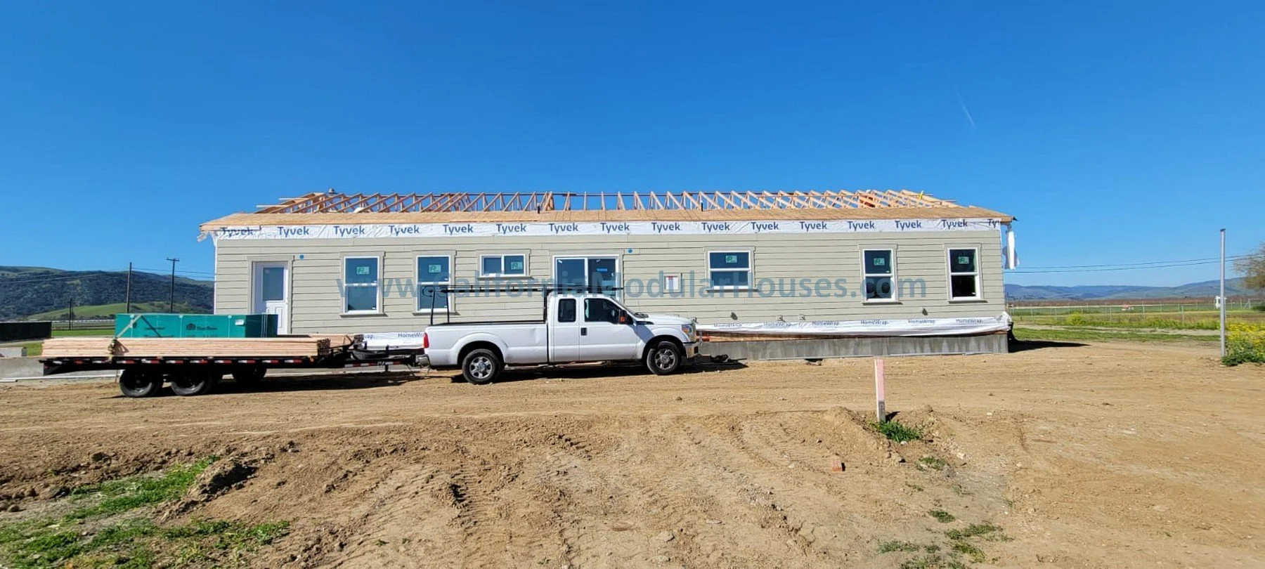 Modules for this factory built home delivered to the job-site in San Juan Bautista.  Custom design.  Prefab modular.  Modular home for California.  