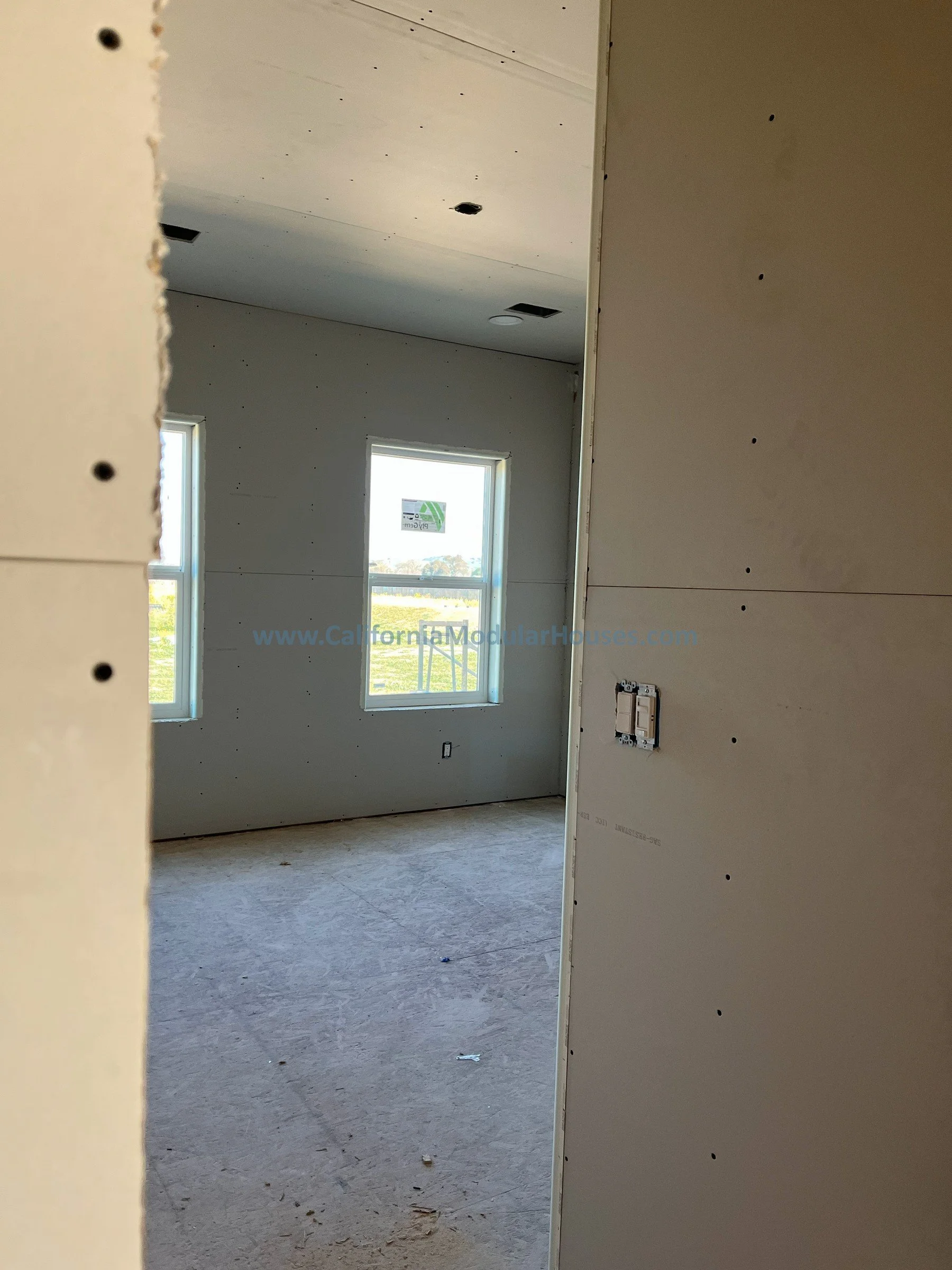 Hallway and great room.  Progress mage of a Factory Built Home for San Juan Bautista CA California Modular  Prefab modulars.  Modular House CA.  