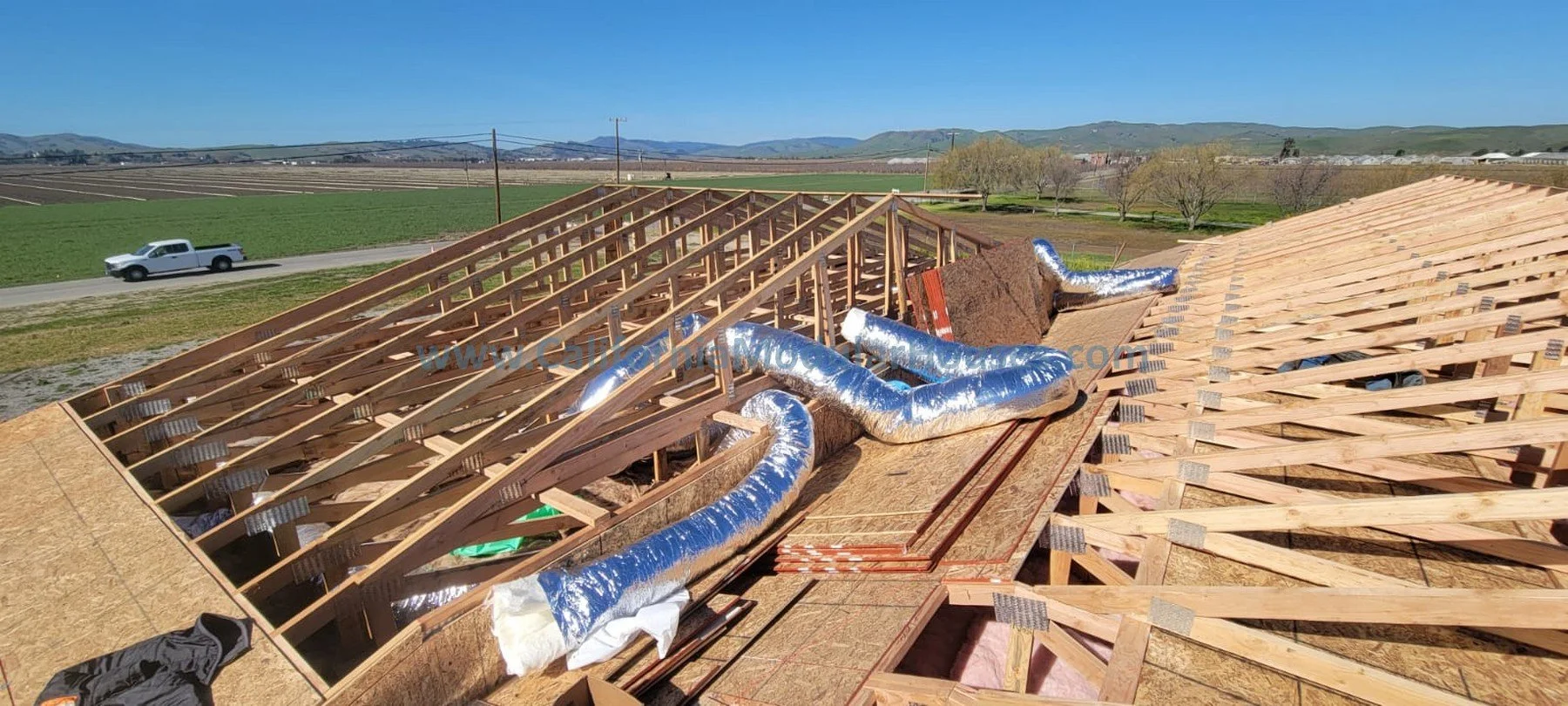 San Juan Bautista, CA.  California Modular.  Prefab California.  New home with large front entrance porch.  Garage built on-site by client's general contractor.  
