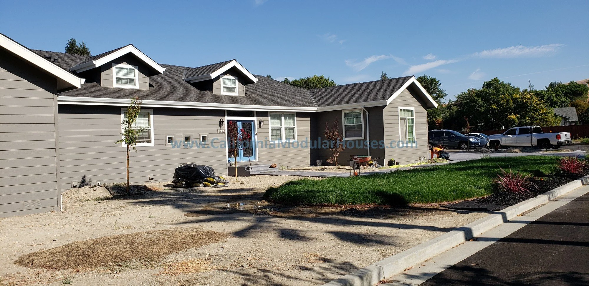 This modular home has a nice roof to make give it the curb appeal desired by the owner of the property and he has an over-sized site built garage for his vehicles and tools.   Concord, Contra Costa County, California.  