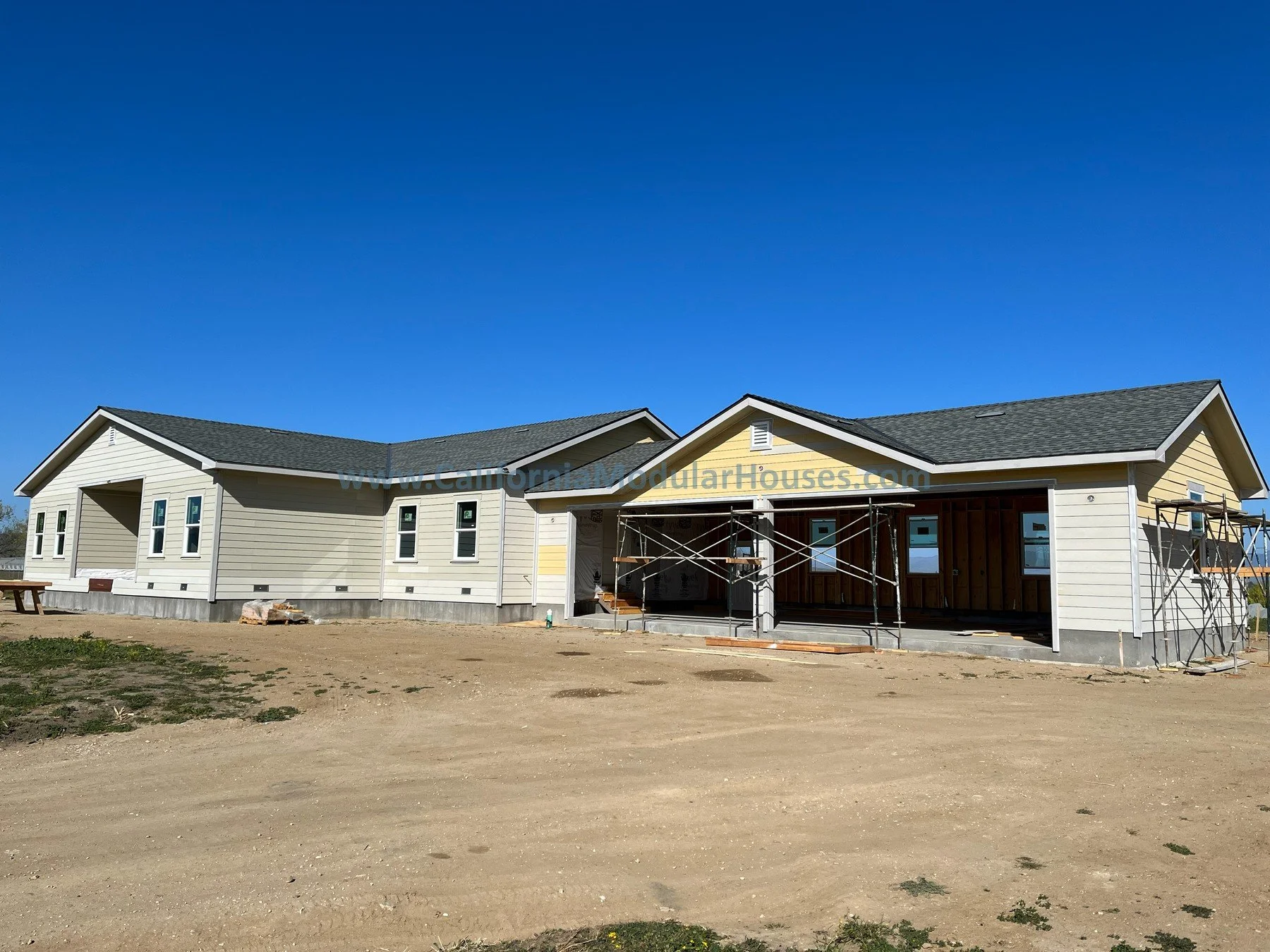 Progress image of a Modular house being completed on-site by the General Contractor  Caliornia  Prefab modular Pre-fab Modulars CA.  